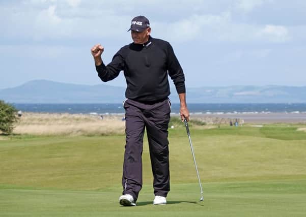 Australian Peter Fowler celebrates after a closing birdie in the Scottish Senior Open at Craigielaw. Photograph: Phil Inglis/Getty Images