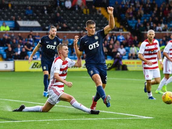 Hamilton's Jamie Hamilton (L) in action with Kilmarnock's Innes Cameron