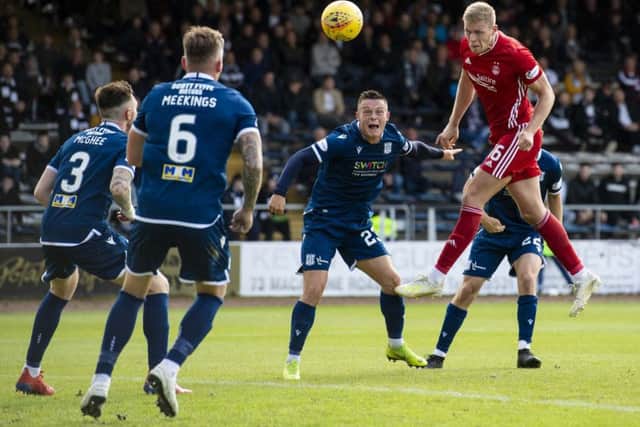 Aberdeen's Sam Cosgrove scores in extra time to make it 2-1. Picture: Craig Foy/SNS