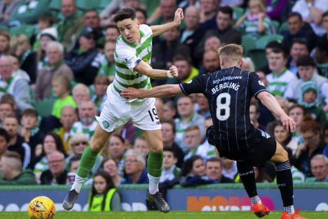 Celtic's Mikey Johnston in action against Dunfermline's Tom Beadling. Picture: Bill Murray/SNS