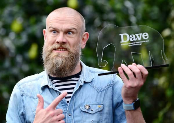 Olaf Falafel  who said performing in Edinburgh every year was painful, like pregnancy  with his award for Daves Funniest Joke at the Fringe. Picture: UKTV Dave/Martina Salvi