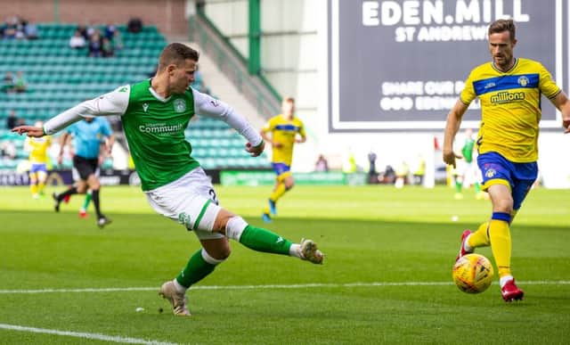Florian Kamberi strokes home the first of his two goals to put Hibs 3-2 ahead at Easter Road. Picture: Bruce White/SNS