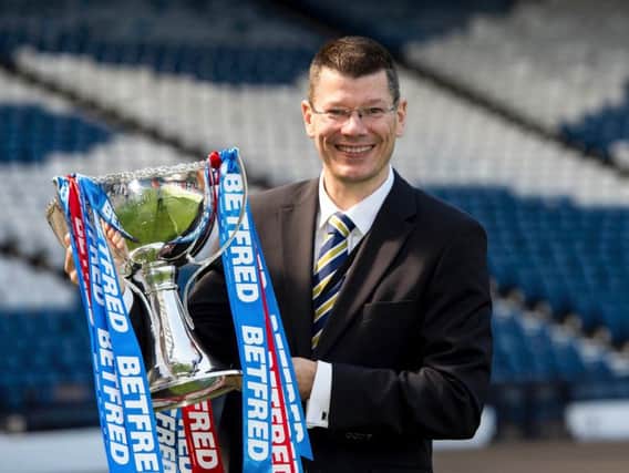 SPFL chief executive Neil Doncaster with the Betfred Cup trophy.