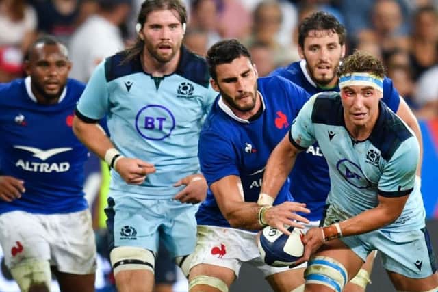 Bloodied flanker Jamie Ritchie is put under pressure by Charles Ollivon as Scotland slumped to defeat by France in Saturday's World Cup warm-up match. Picture: Pascal Guyot/AFP