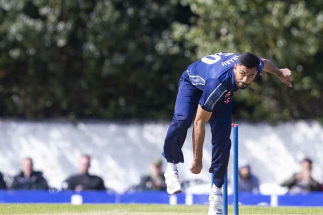 Safyaan Sharif took three wickets during Scotland's victory over Oman. Picture: SNS.