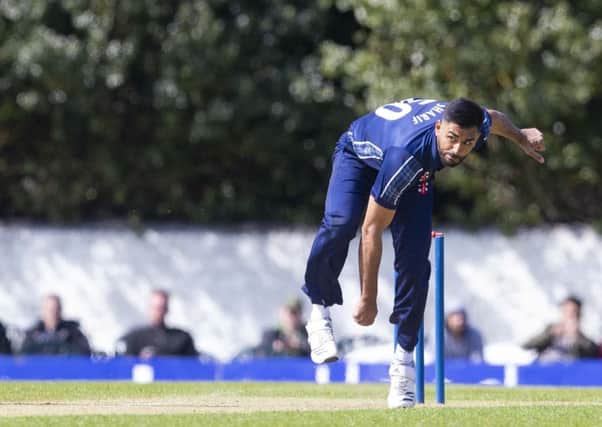 Safyaan Sharif took three wickets during Scotland's victory over Oman. Picture: SNS.