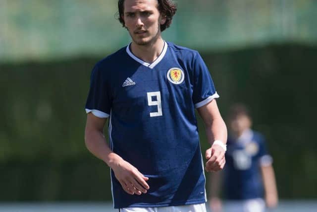 The striker has yet to play a competitive match at first-team level. A number of clubs are keen on a striker.