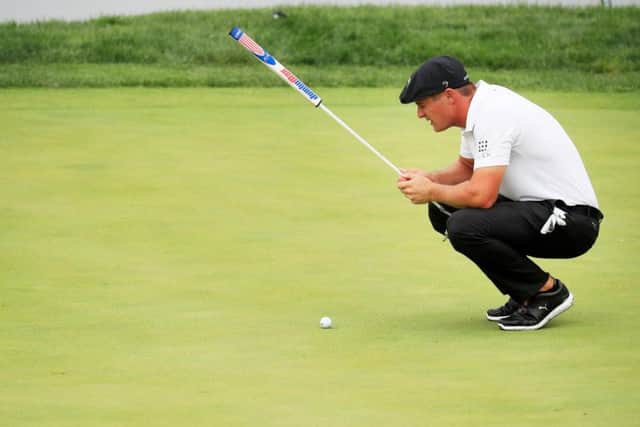 Bryson DeChambeau took two minutes and 20 seconds to hit an eight-foot putt. Picture: Cliff Hawkins/Getty Images