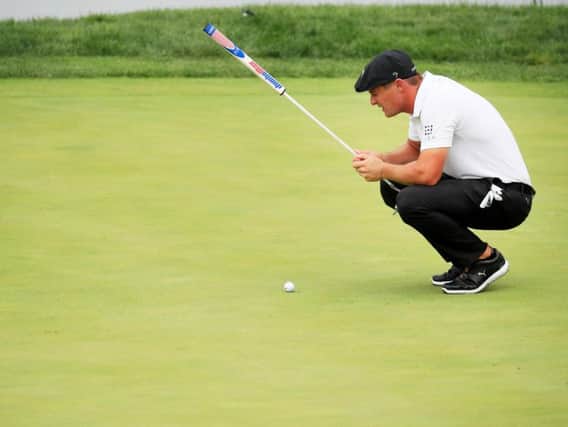 Bryson DeChambeau took two minutes and 20 seconds to hit an eight-foot putt. Picture: Cliff Hawkins/Getty Images