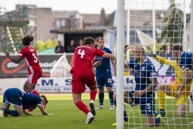 Aberdeen's Andrew Considine nets the last minute equaliser against Dundee in the Betfred Cup. Picture: Craig Foy/SNS
