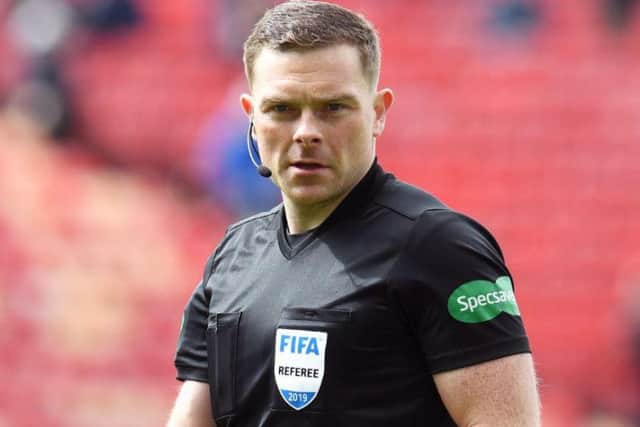 John Beaton was accused by Tom Boyd of a "pre-meditated decision" not to award Celtic a penalty against Dunfermline