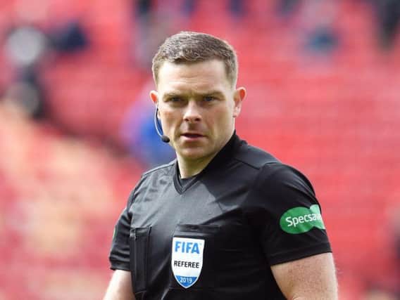 John Beaton was accused by Tom Boyd of a "pre-meditated decision" not to award Celtic a penalty against Dunfermline