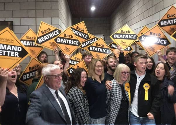 The Scottish Lib Dems celebrate after Beatrice Wishart wins the Shetland by-election