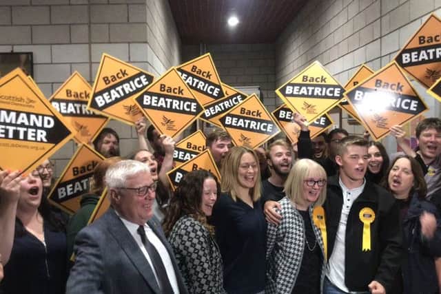The Scottish Lib Dems celebrate after Beatrice Wishart wins the Shetland by-election