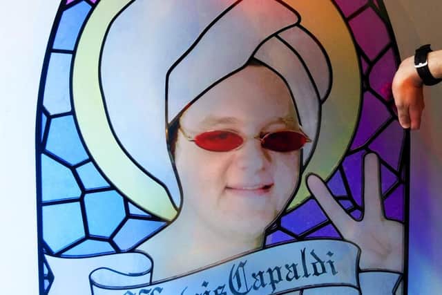 A stained glass image of Lewis Capaldi's face appears at the #ScottishTwitter visitor centre.
