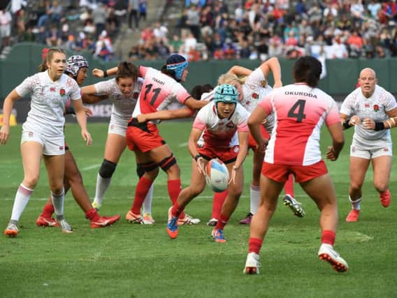 England take on Japan during the Women's Challenge Final at the Rugby Sevens World Cup 2018