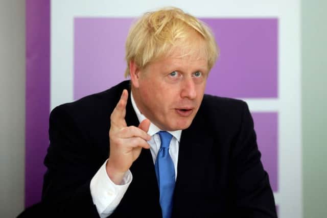 Britain's Prime Minister Boris Johnson (Photo by Kirsty Wigglesworth/AFP/Getty Images)