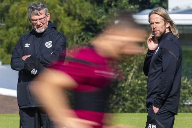 Hearts manager Craig Levein oversees training with assistant Austin MacPhee. Picture: SNS