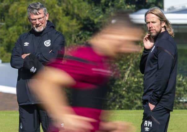Hearts manager Craig Levein oversees training with assistant Austin MacPhee. Picture: SNS