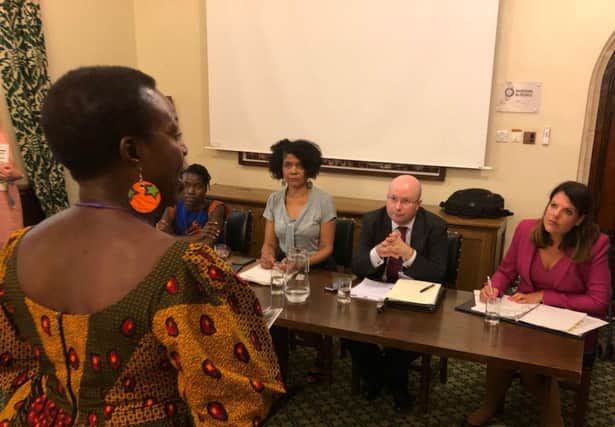 A member of the public sharing her frustrations with the then Immigration Minister Caroline Nokes MP. Also pictured are (L to R): Dr Robtel Neajai Pailey, Chi Onwura MP and Patrick Grady MP.