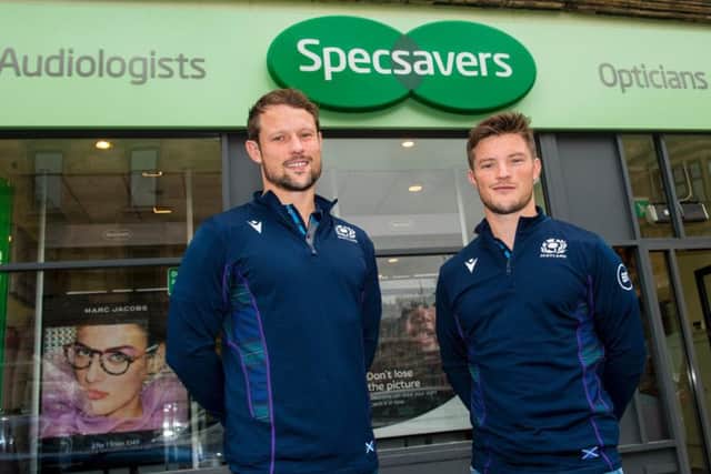 Players Pete and George Horne outside the Specsavers Byres Road store where they recently had their eyes tested. Picture: Contributed