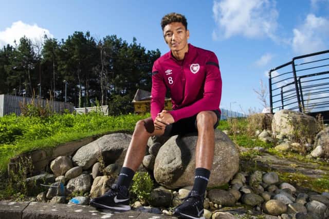 Sean Clare takes time out from a Hearts training session at the Oriam to discuss their Premiership match against Celtic. Picture: SNS.