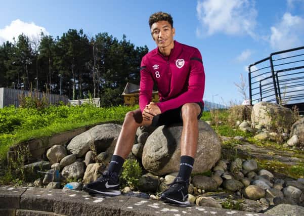 Sean Clare takes time out from a Hearts training session at the Oriam to discuss their Premiership match against Celtic. Picture: SNS.