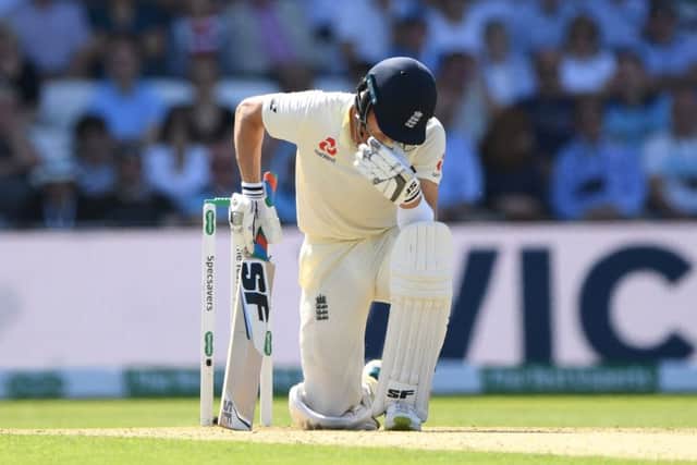 England's top scorer Joe Denly reacts after being dismissed by James Pattinson for 12. Picture: Stu Forster/Getty Images