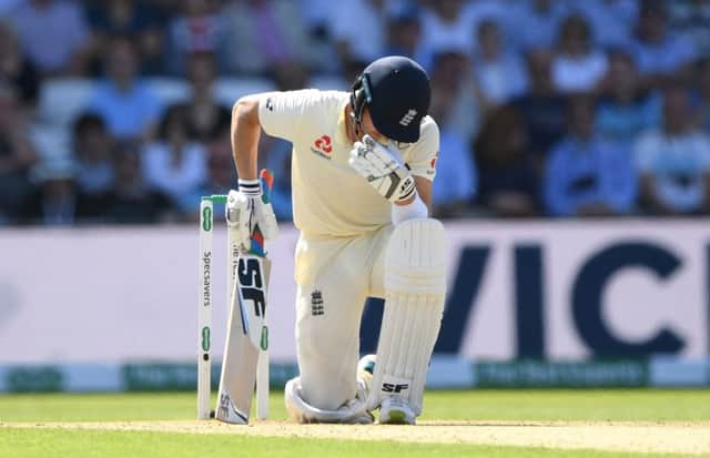 England's top scorer Joe Denly reacts after being dismissed by James Pattinson for 12. Picture: Stu Forster/Getty Images