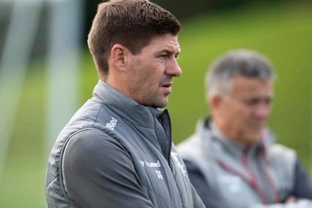 Steven Gerrard oversees training.