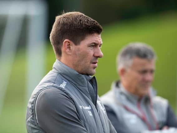 Steven Gerrard oversees training.