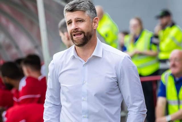 Stephen Robinson looks on during the win over Hamilton.