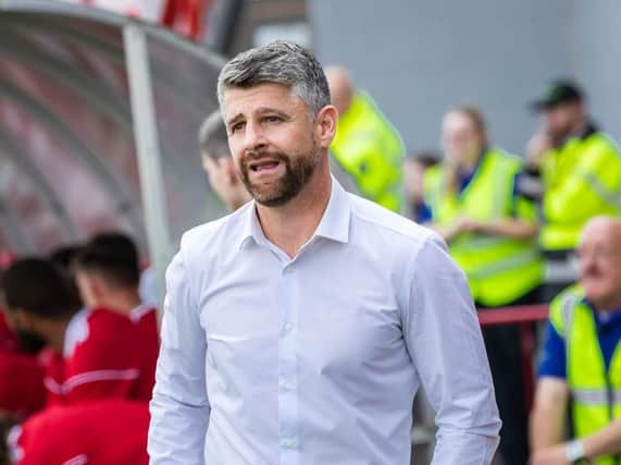 Stephen Robinson looks on during the win over Hamilton.