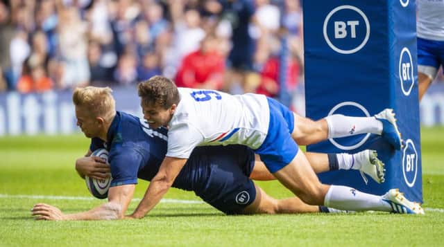 Scotland centre Chris Harris dives over the tryline to score against France. Picture: Gary Hutchison/SNS/SRU