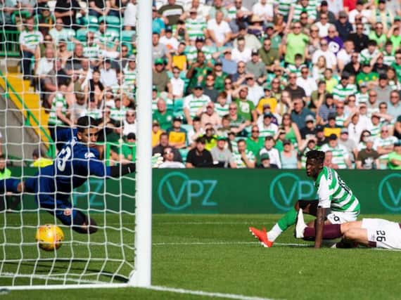 Vakoun Bayo looks on as the ball finds the back of the net past Hearts goalkeeper Joel Pereira.