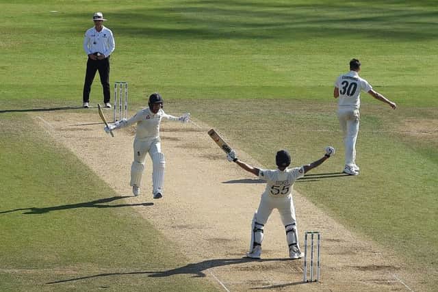 The moment of victory. Jack Leach, second left, and Ben Stokes celebrate after completing Englands incredible fightback at Headingley. Picture: AFP/Getty