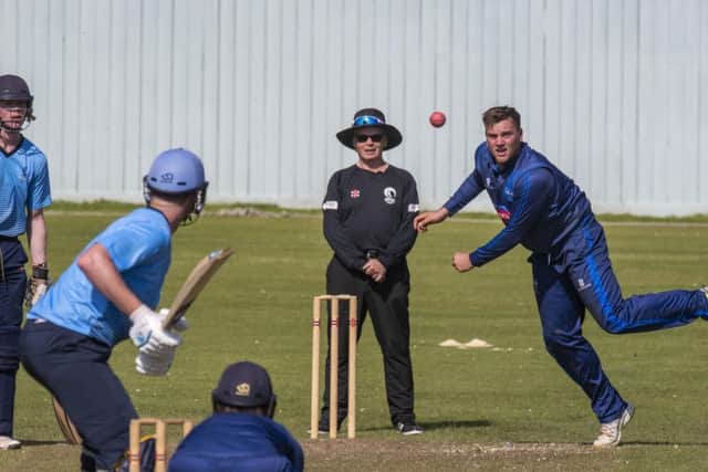 Mark Watt sends down a delivery during Carltons innings. Picture: Donald MacLeod