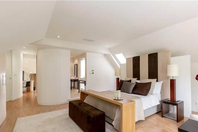 The master bedroom is one of four bedrooms in the house.