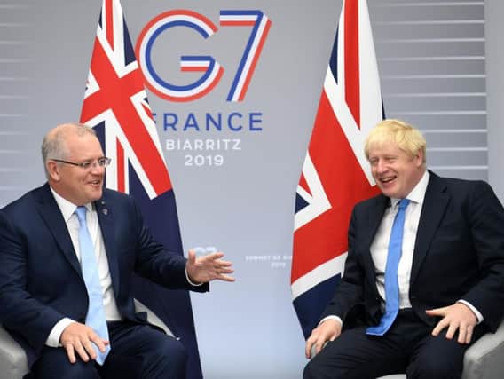 Australian Prime Minister Scott Morrison (left) with UK leader Boris Johnson