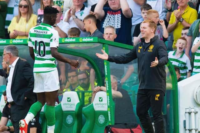 Vakoun Bayo is congratulated by Neil Lennon. Picture: SNS