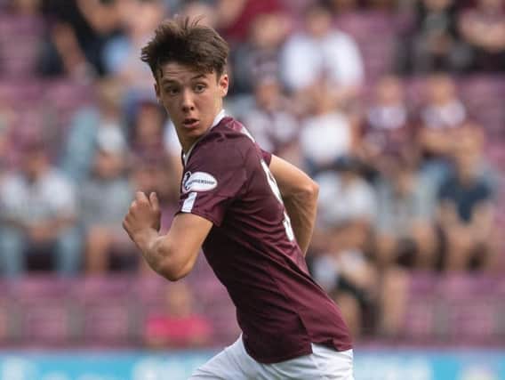 Aaron Hickey in action for Hearts at Tynecastle