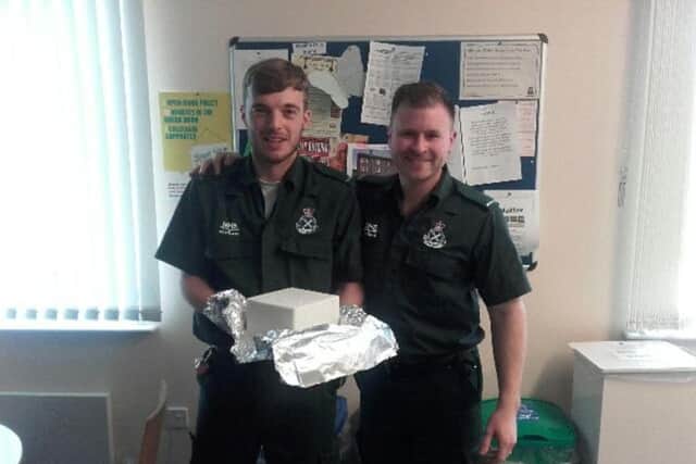Aberdeenshire-based staff, Spencer Staddon, Sarah Rose and Connor Melville were given the cake. Picture: Contributed