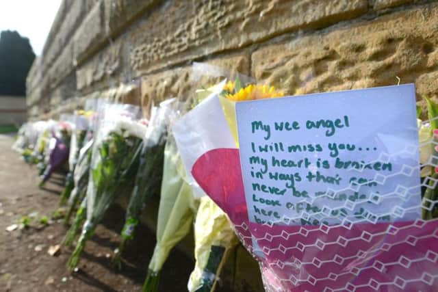 A number of heartfelt floral tributes have been left for the 12-year-old. Picture: SWNS