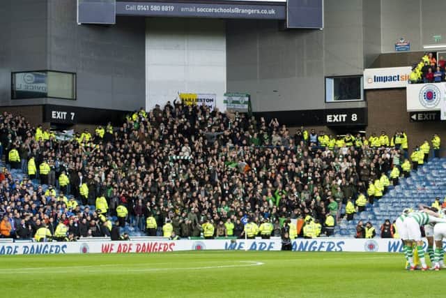 Celtic fans were shoehorned into a corner of Ibrox last season when Rangers cut the clubs ticket allocation. Picture: SNS