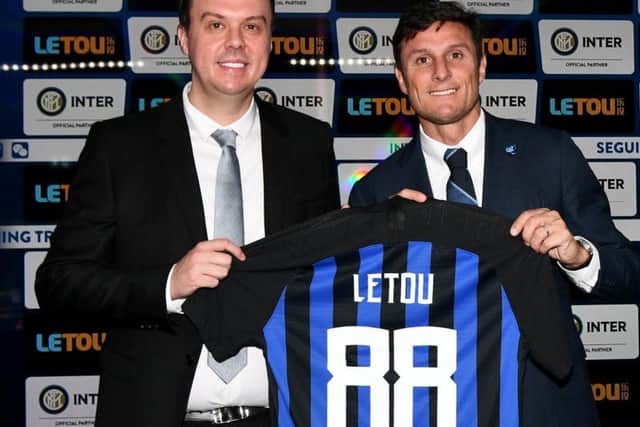 Paul Fox (left) and Javier Zanetti, former Inter Milan player and now vice-president at the Italian club. Picture: Claudio Villa.