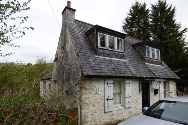 This three bedroom detached cottage is situated in the village of Moniaive and is for sale with a guide price of GBP5,000.