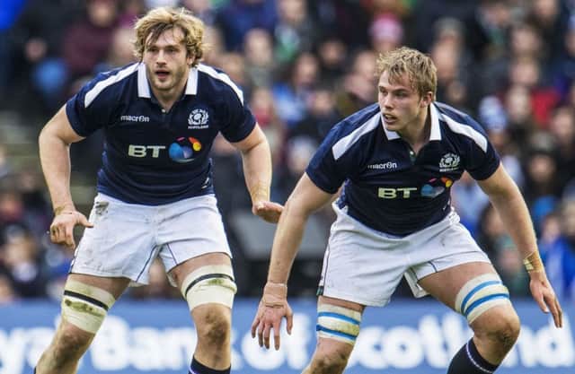 Jonny Gray, right, in action for Scotland during the 2017 Six Nations with his brother Richie, who has made himself unavailable for next month's World Cup. Picture: SNS/SRU