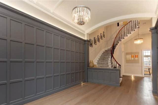 The panelled entrance hall.