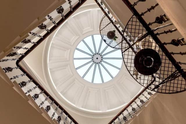 The property is set over four floors and has an elegant staircase off the entrance hallway.