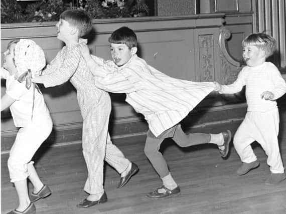 Miller's impact spanned time and place. Here, children in Edinburgh enjoy a Wee Willie Winkie party in their pyjamas in the early 1960s. PIC: TSPL.